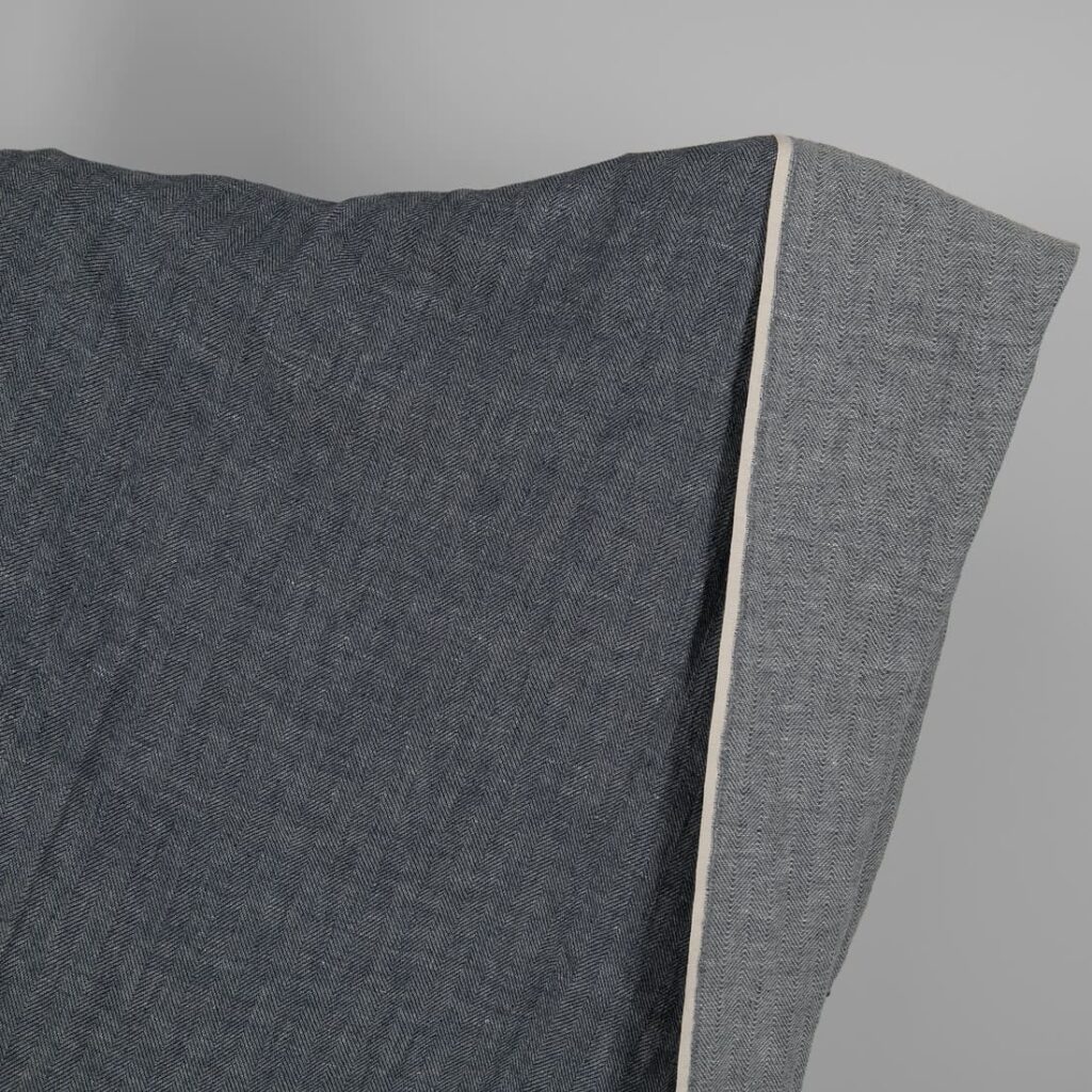 Washed linen wool fabric black white in herringbone pattern
