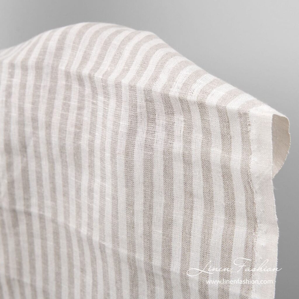 Linen fabric for tea towels in white and flax color stripes