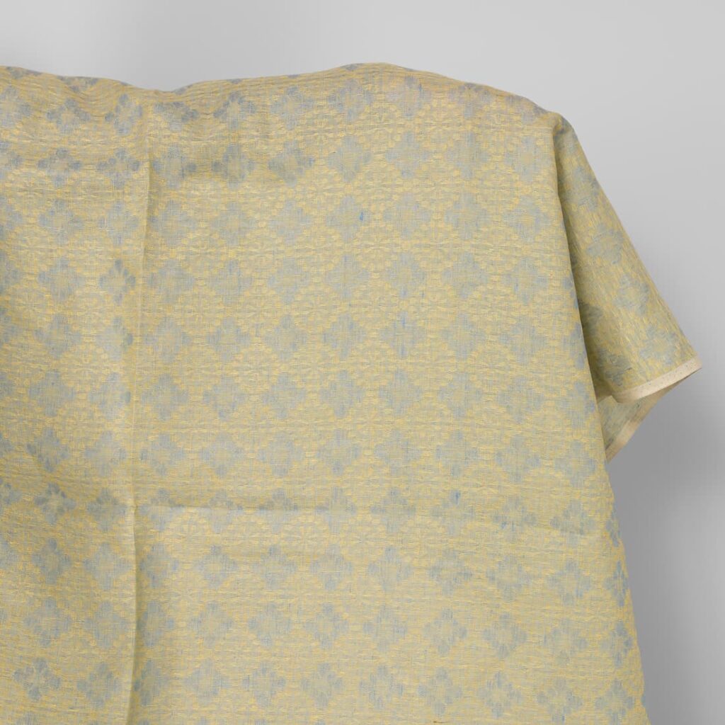 Linen fabric in light blue and yellow floral jacquard