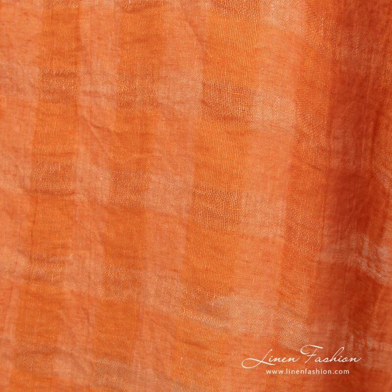 Orange linen fabric in transparent checks, perfect for clothes, curtains, scarves, tablecloths