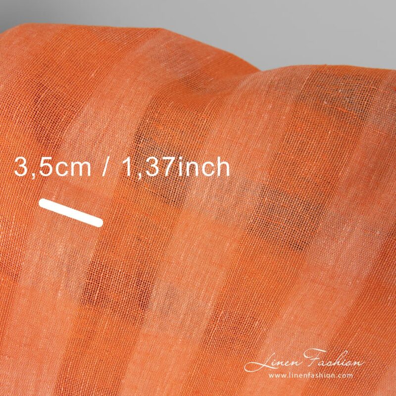 Orange dyed 100% linen fabric.