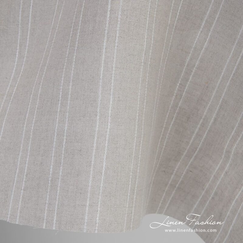 Natural color linen fabric in delicate white stripes