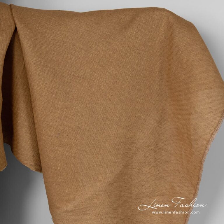 Brown melange linen fabric in diagonal pattern.