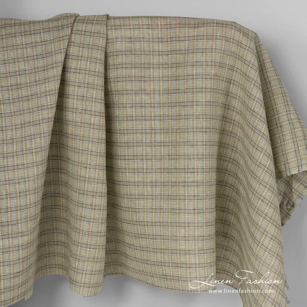 Checked linen fabric in green colour.