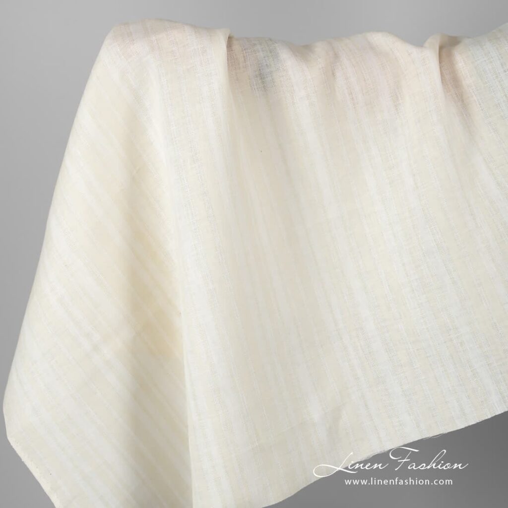 Linen fabric in ecru stripes.