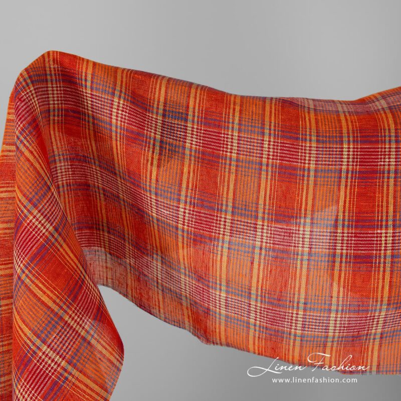 Transparent linen fabric in red orange checks.