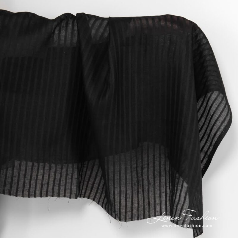 Black lightweight striped linen fabric.