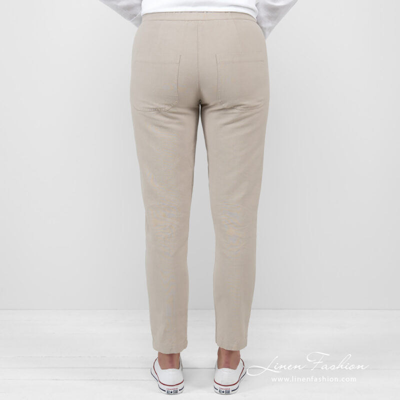 linen cotton beige pants jeans from backside.