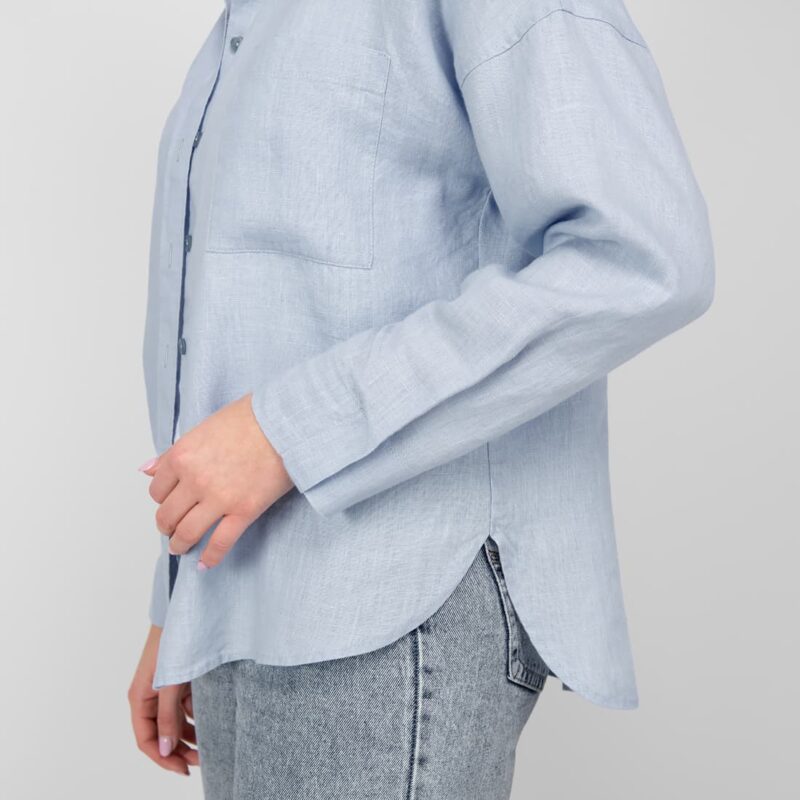 light blue linen shirt blouse; rounded bottom