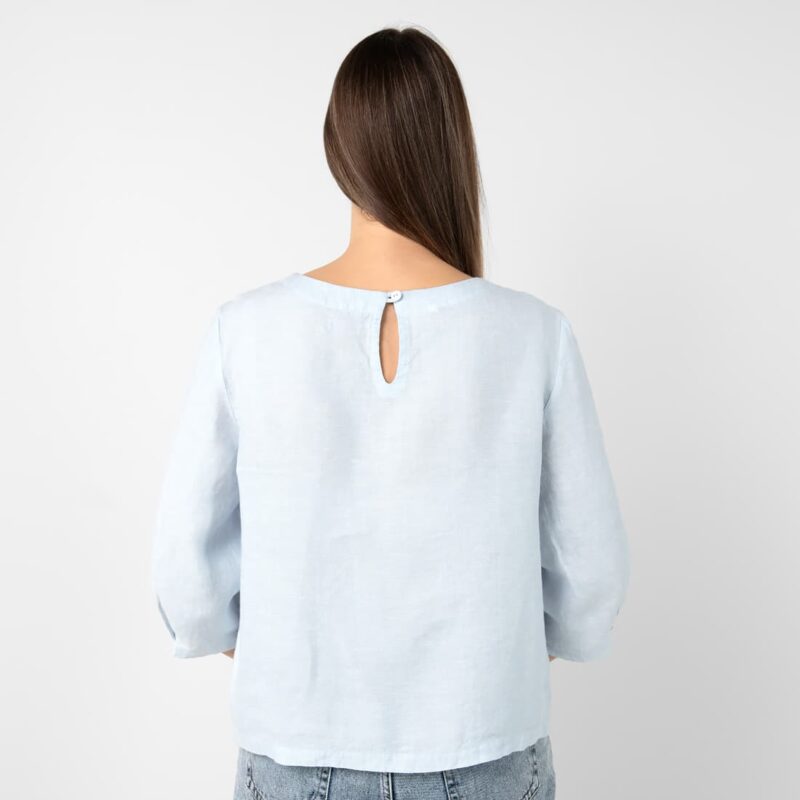 Light blue linen blouse, button closure on back