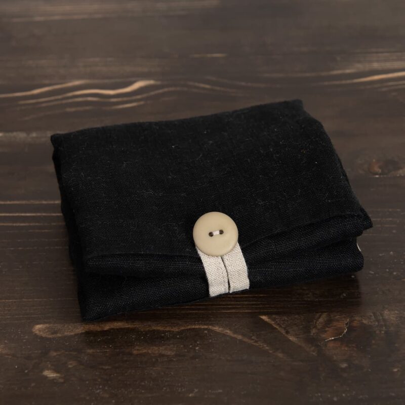 Black linen tote bag folded up