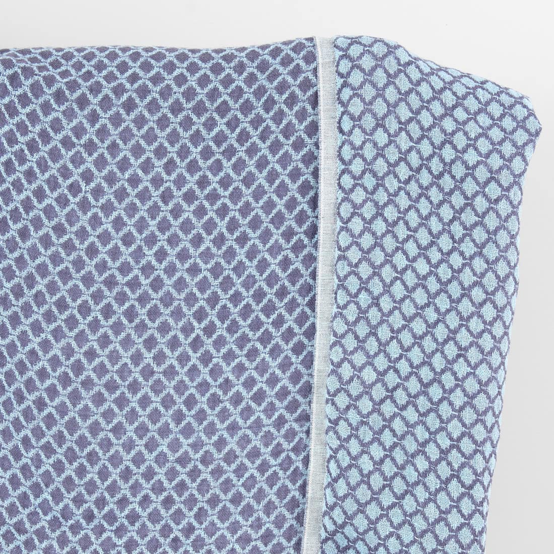 Blue double-sided washed linen fabric in a diamond pattern