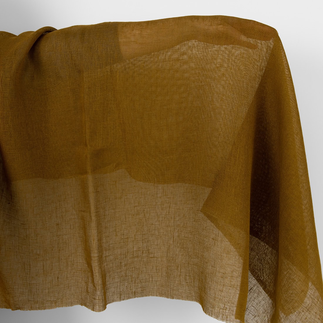 Sheer linen fabric golden brown, washed