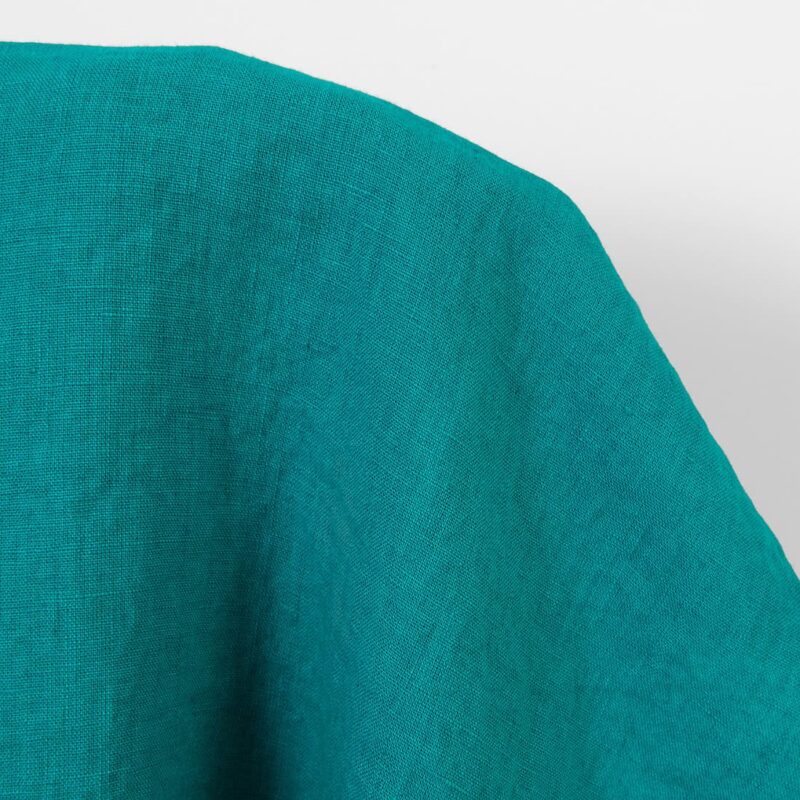 Linen fabric in tile blue, washed