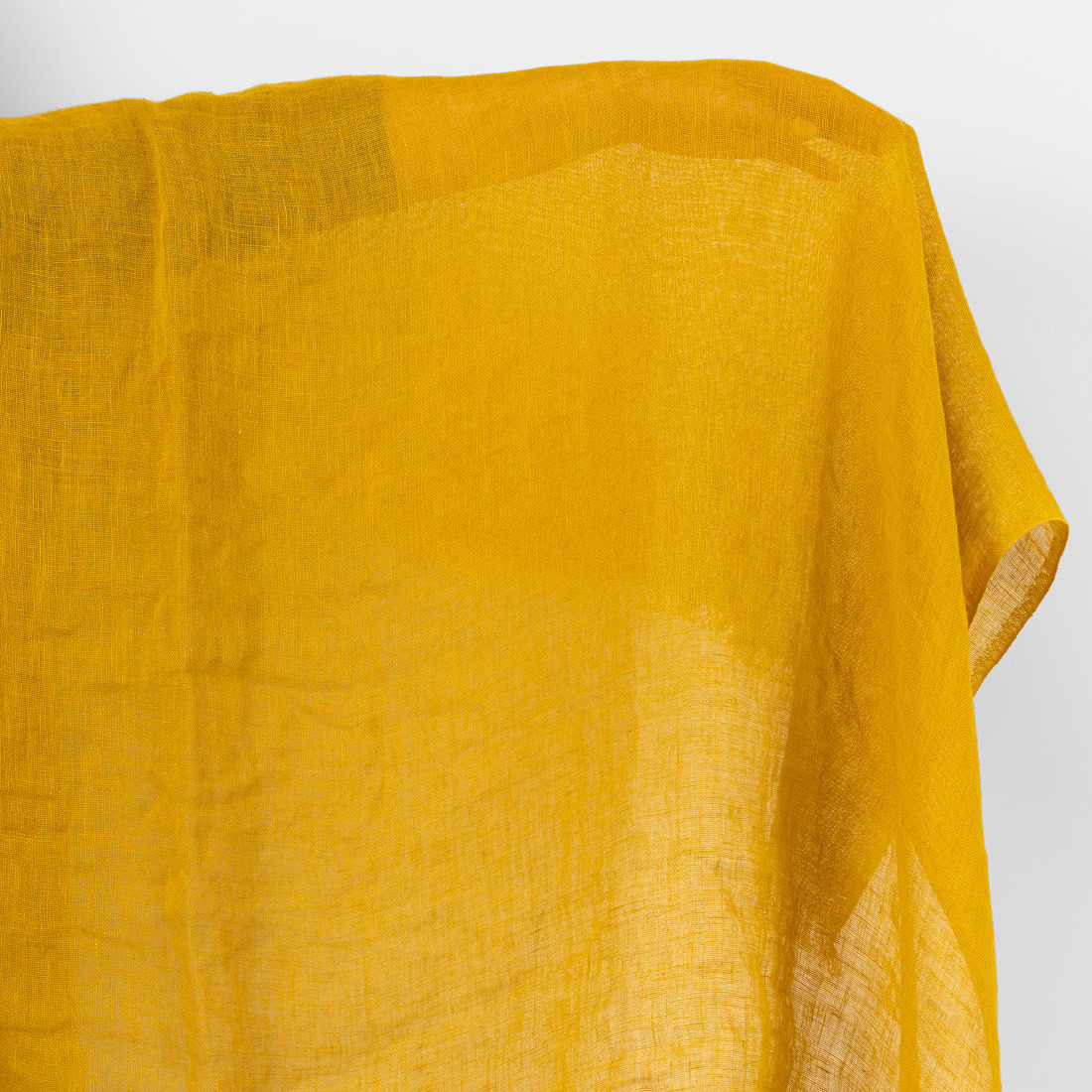 Sheer linen fabric golden ochre, washed