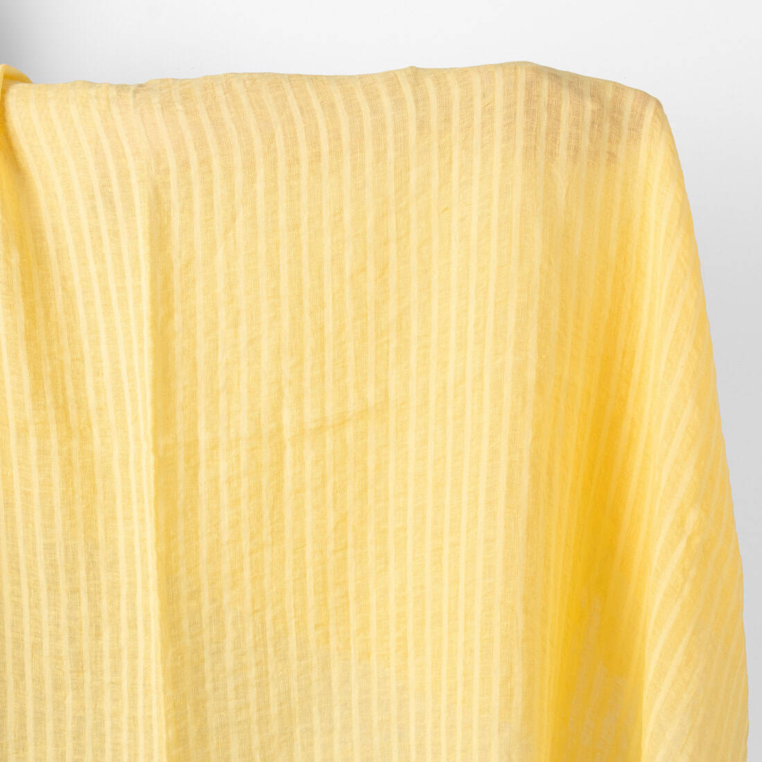 Lightweight linen fabric yellow transparent stripes, washed